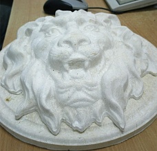Резьба голова льва из натурального камня
